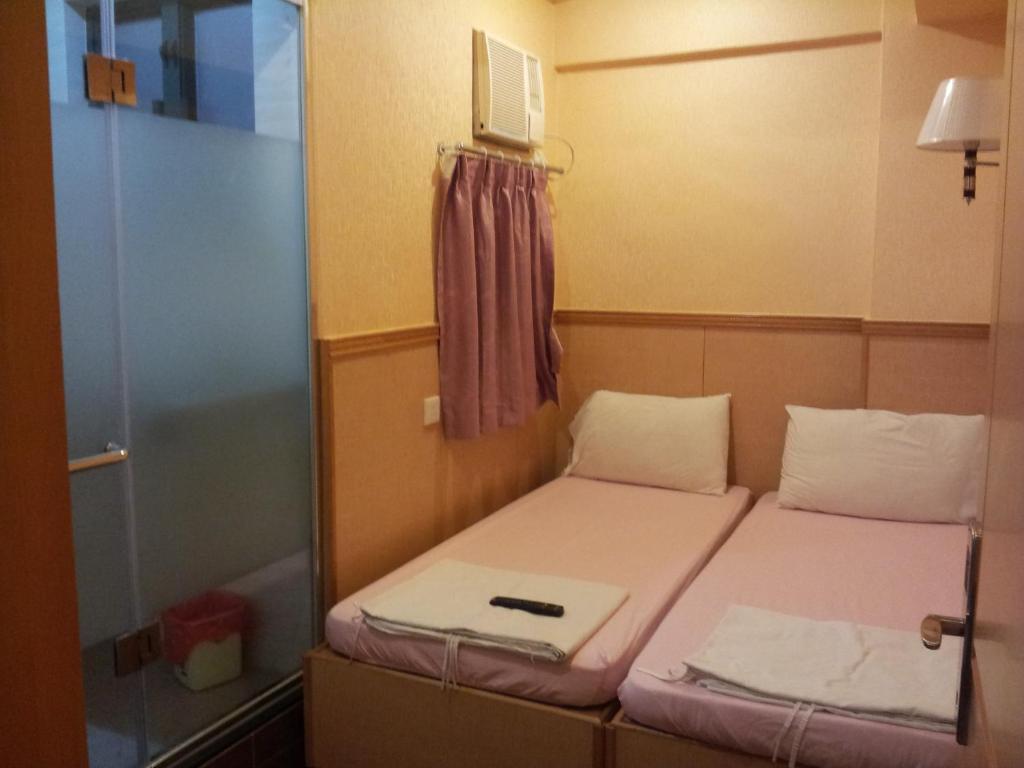 New Garden Hostel Хонконг Стая снимка
